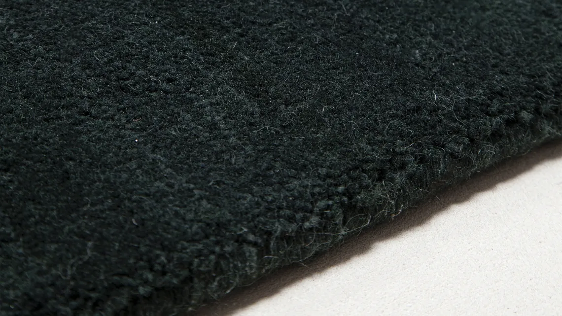 Tappeto tinta unita Calamandra realizzato in lana neozelandese e lana sarda di Poltrona Frau