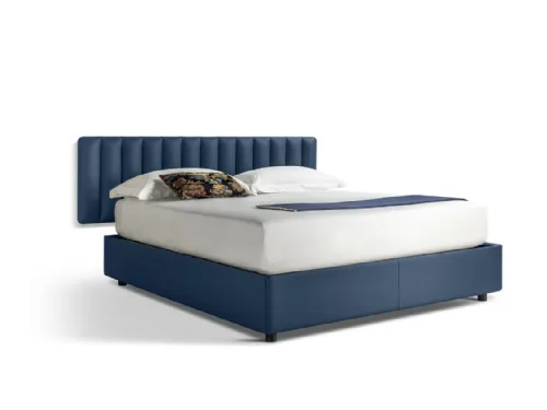 Letto sommier in pelle Ferdinandea con contenitore e boiserie di Poltrona Frau