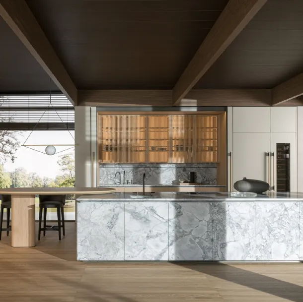 Cucina Design con penisola Intersection in Marmo Superwhite e Rovere Sunrise di Dada