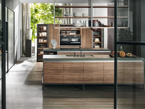 Cucina lineare in legno essenza noce e piano in pietra verde di Dada