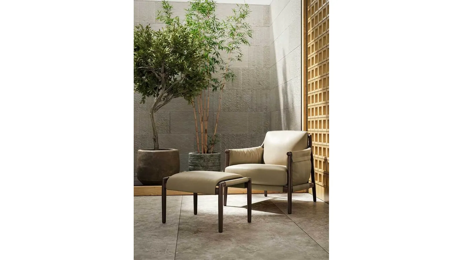 Pouf Times Lounge rivestito in pelle con struttura in massello di Frassino di Poltrona Frau