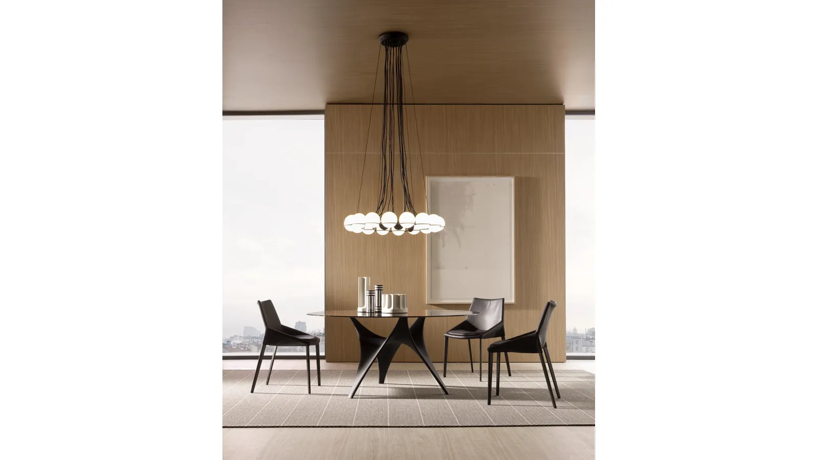 Tavolo rotondo con top in Vetro e base scultorea in Cemento Bronzo Arc di Molteni & C